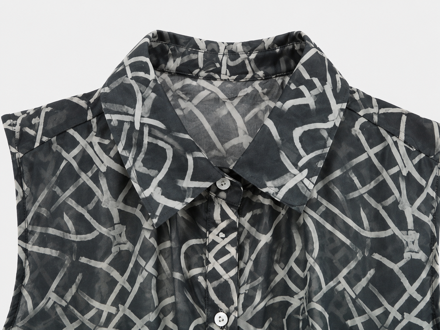 Blusa sin mangas cuello camisero